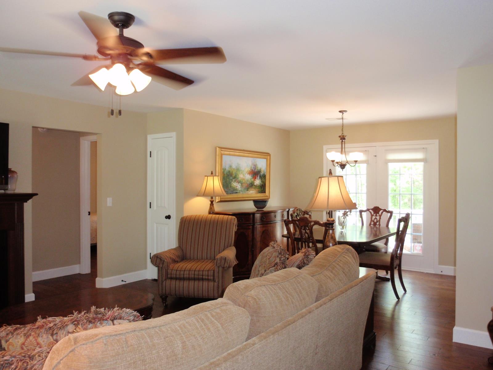 206 Black Road Dickson, TN 37055 - Photo 8 of 22 a living room with furniture and a chandelier