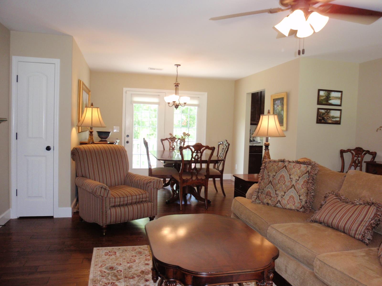 206 Black Road Dickson, TN 37055 - Photo 9 of 22 a living room with furniture and a chandelier