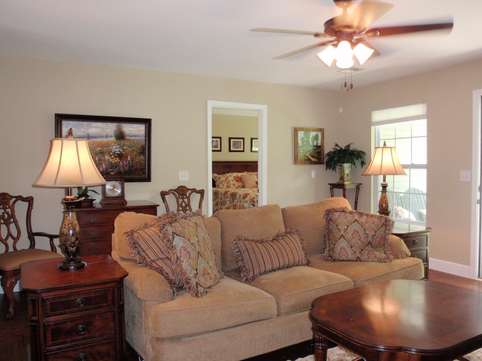 206 Black Road Dickson, TN 37055 - Photo 10 of 22 a living room with furniture and a lamp