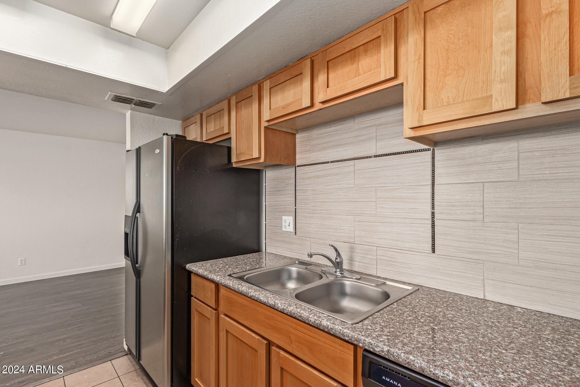 18202 North Cave Creek Road, Unit 228 Phoenix, AZ 85032 - Photo 16 of 31 Updated cabinets and backsplash
