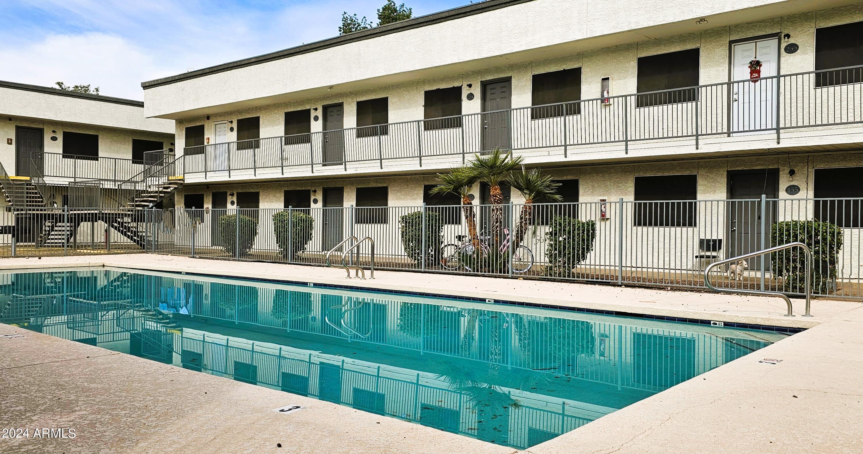 18202 North Cave Creek Road, Unit 228 Phoenix, AZ 85032 - Photo 31 of 31 Community Pool! Just a few steps away!