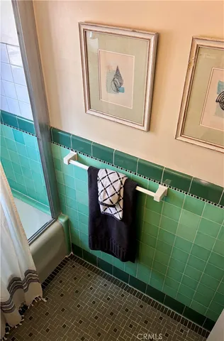 a view of a door and chair in a room