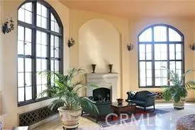 a view of a terrace with a table and chairs