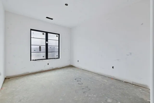 an empty room with closet