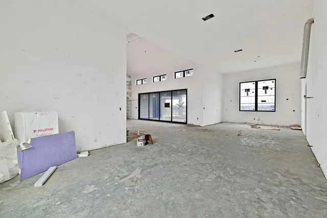 a view of livingroom with furniture and windows