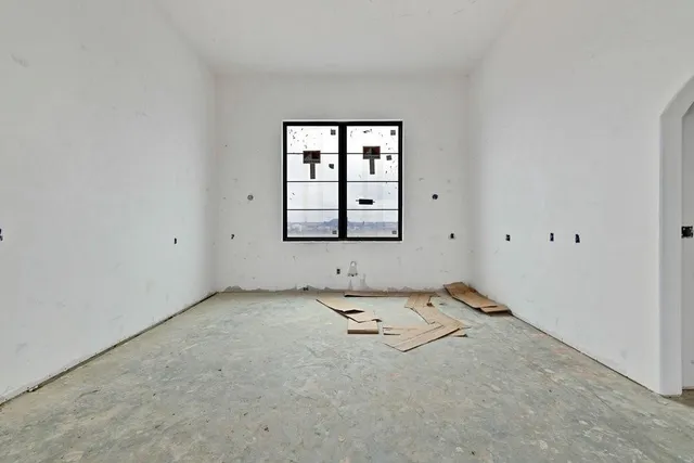 an empty room with windows