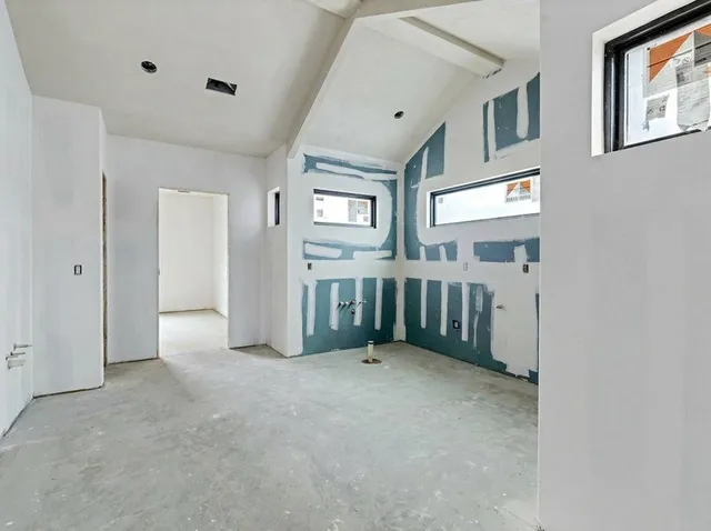 an empty room with windows