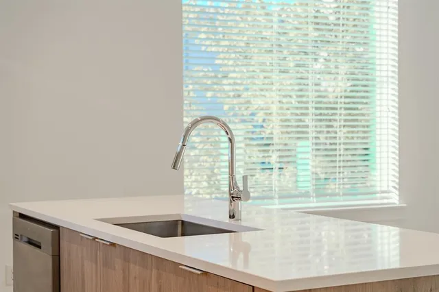 a view of a kitchen from a window