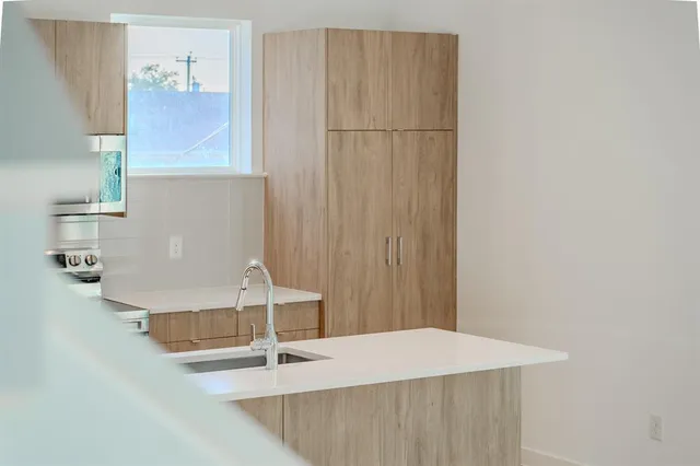 a room with a table and chairs