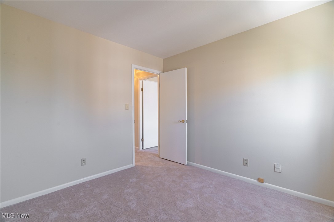 2089 Wooster Road, Unit C42 Rocky River, OH 44116 - Photo 21 of 43 Second bedroom with newly installed carpeting