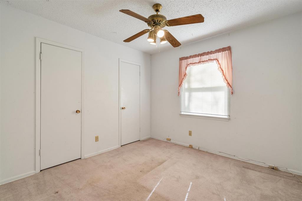 1832 Wonderlight Lane Dallas, TX 75228 - Photo 31 of 39 a view of an empty room with a window