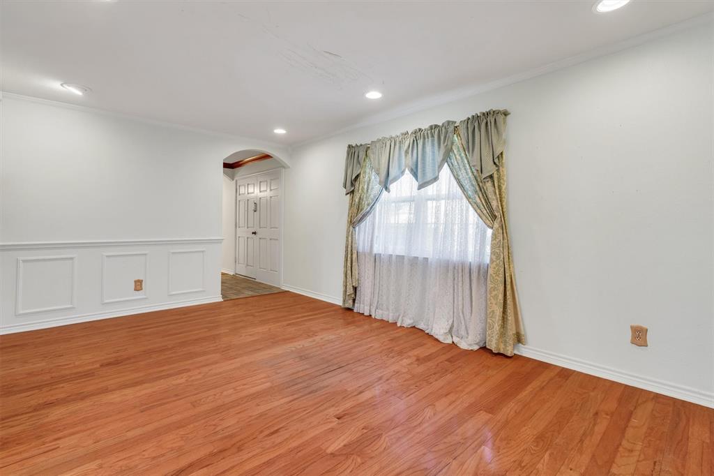 1832 Wonderlight Lane Dallas, TX 75228 - Photo 6 of 39 a view of empty room with wooden floor