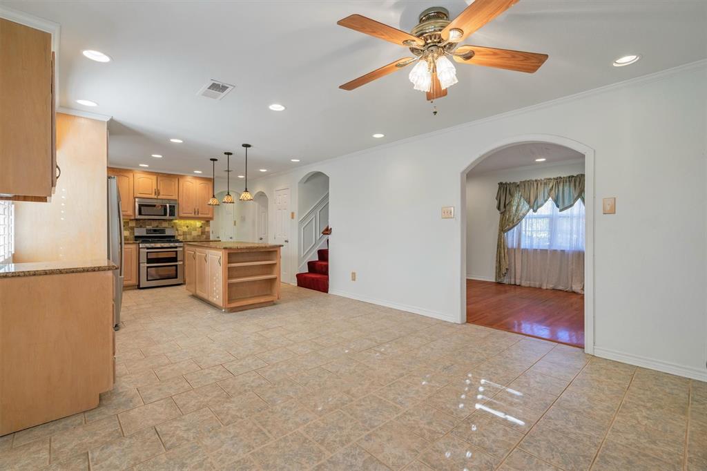1832 Wonderlight Lane Dallas, TX 75228 - Photo 10 of 39 a view of kitchen and microwave