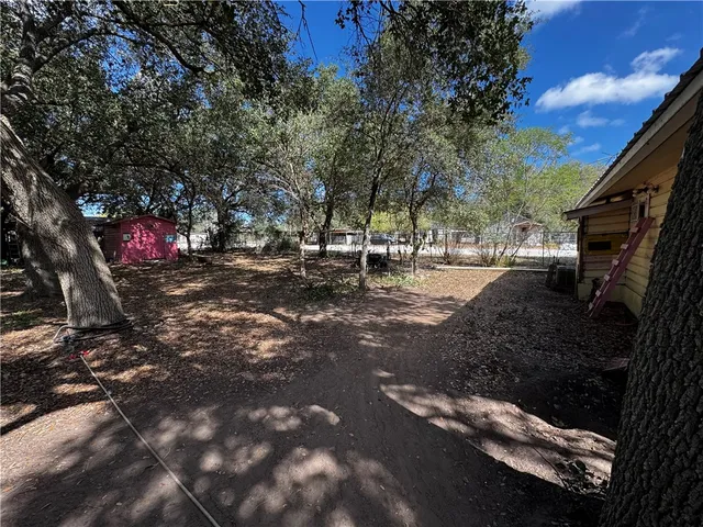 a view of a street with of trees
