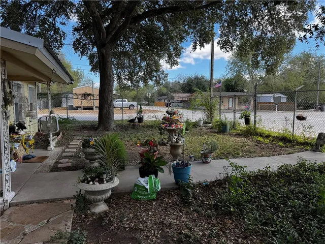 a view of a garden with patio