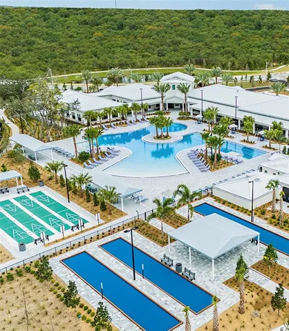 a view of a swimming pool with an ocean view