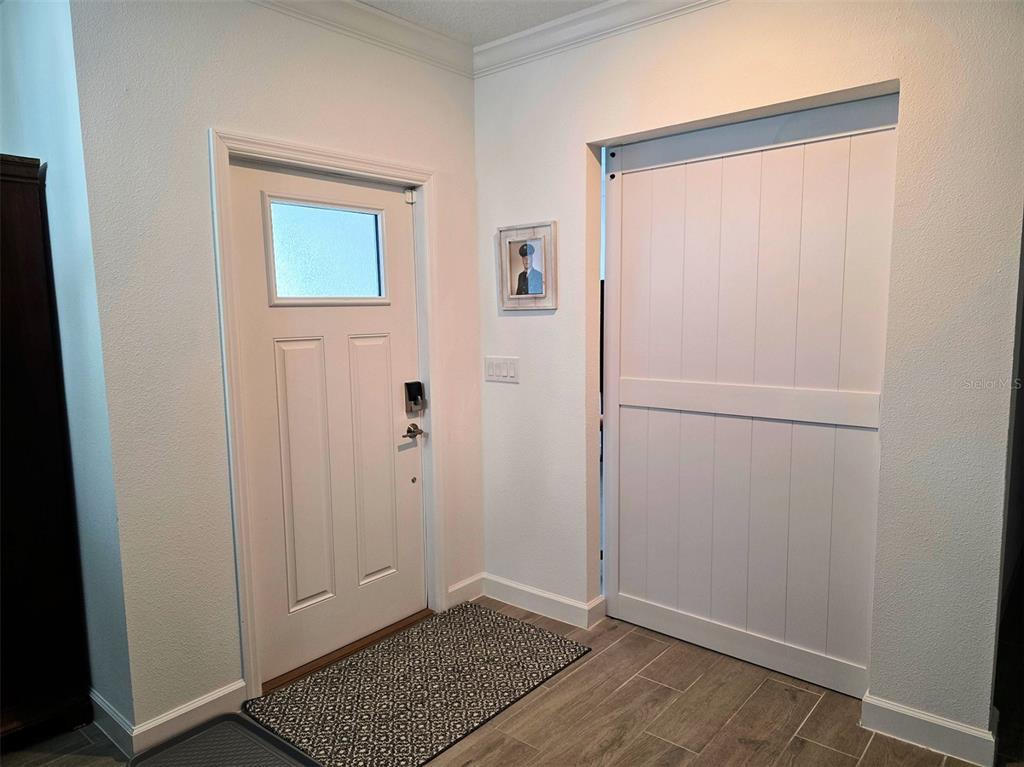 16890 Forge Surf Street Land O Lakes, FL 34638 - Photo 3 of 26 a view of an empty room