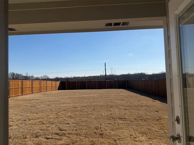 a view of outdoor space and yard