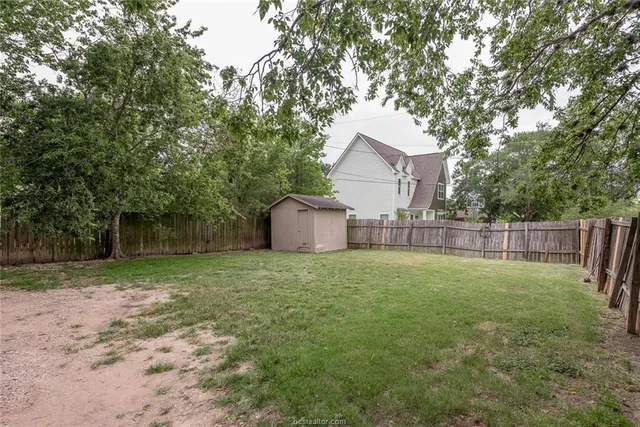 a house with trees in front of it