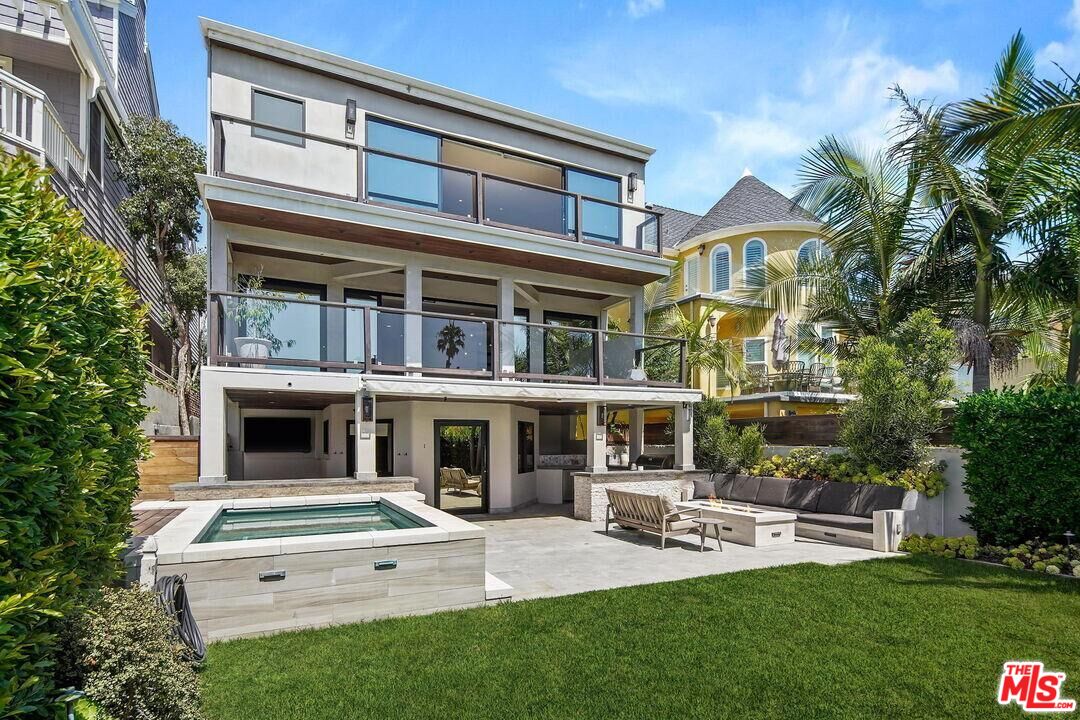 a view of an apartment with a garden and plants