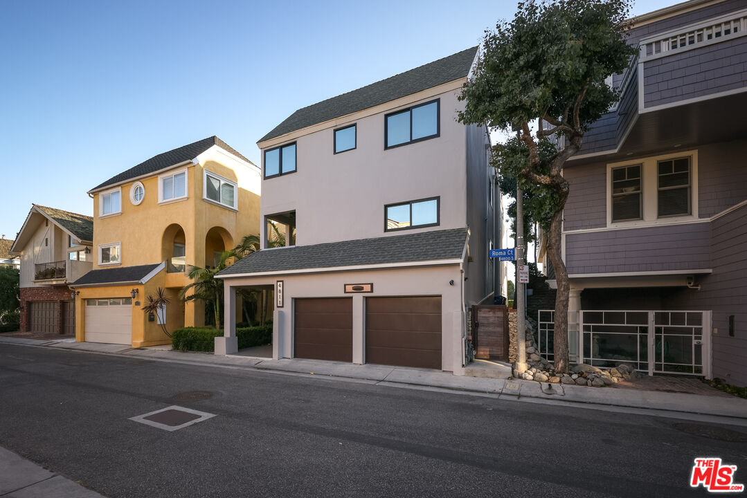 4811 Roma Court Marina del Rey, CA 90292 - Photo 2 of 57 a front view of a house with a yard