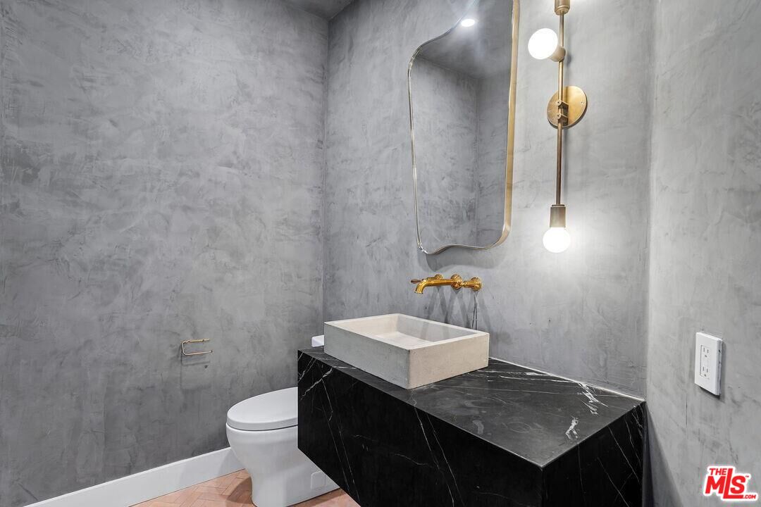 4811 Roma Court Marina del Rey, CA 90292 - Photo 10 of 57 a bathroom with a sink and a toilet