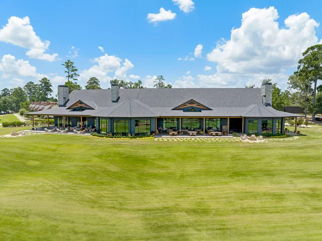 a front view of a house with swimming pool