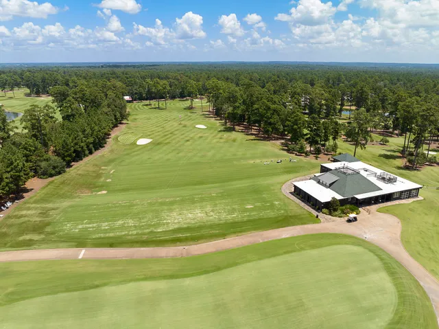 a view of a swimming pool and an outdoor space