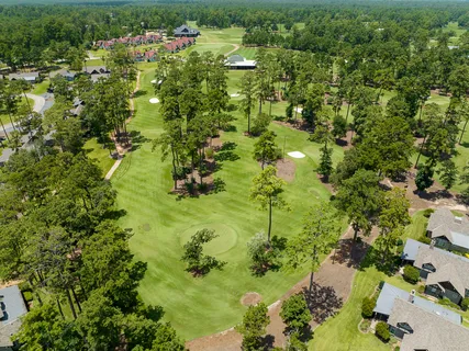 a view of swimming pool with seating area