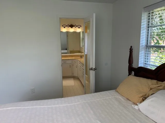a kitchen with stainless steel appliances a sink stove and cabinets