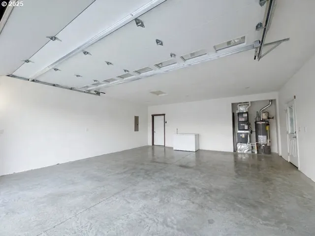 a view of house with outdoor space and pool