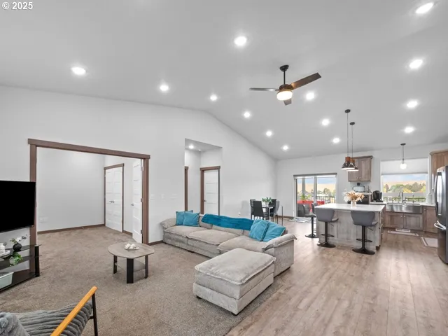 a kitchen with a sink cabinets and window