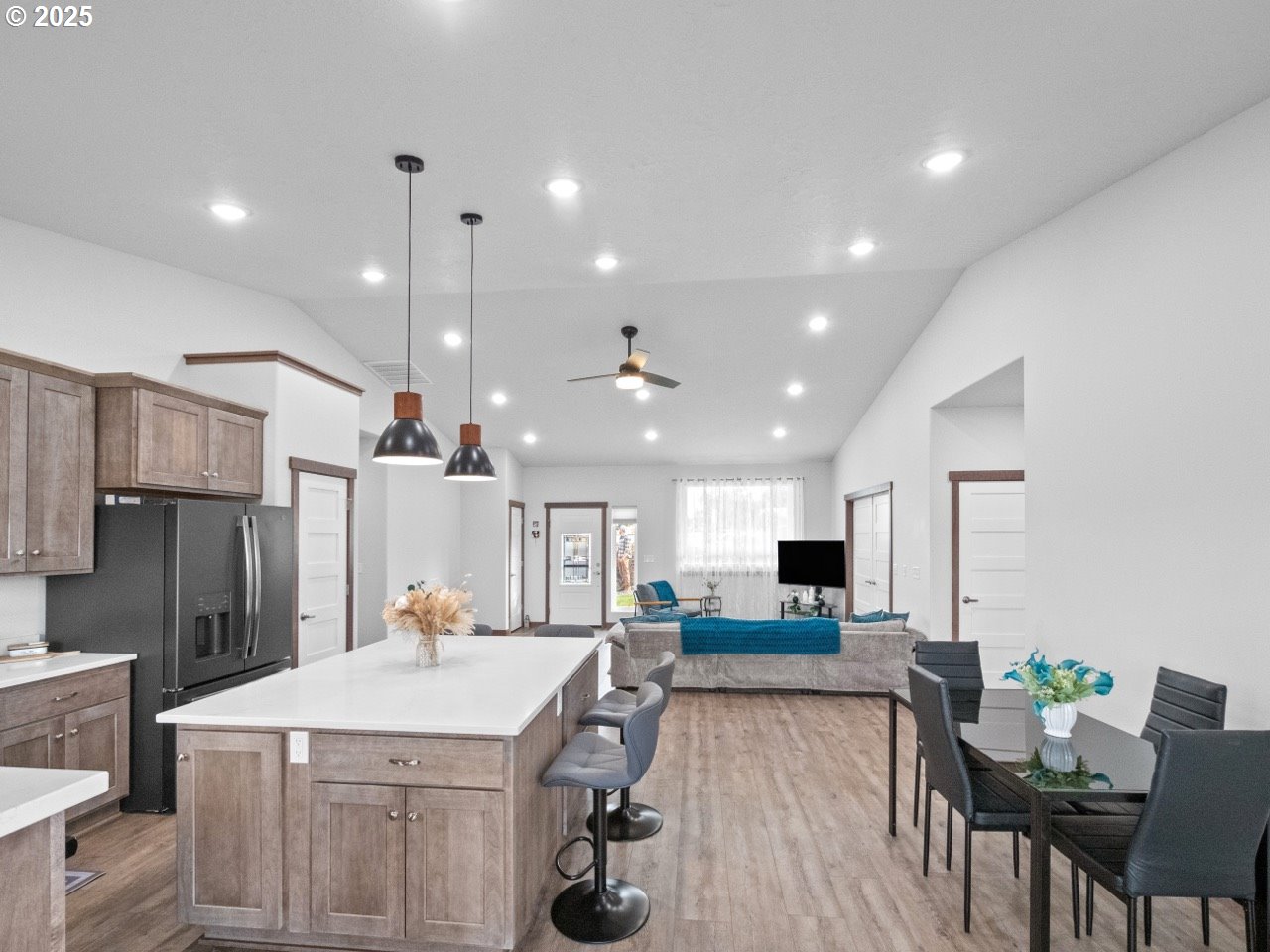 692 Southwest Runnion Avenue Pendleton, OR 97801 - Photo 5 of 35 a large kitchen with a table and chairs