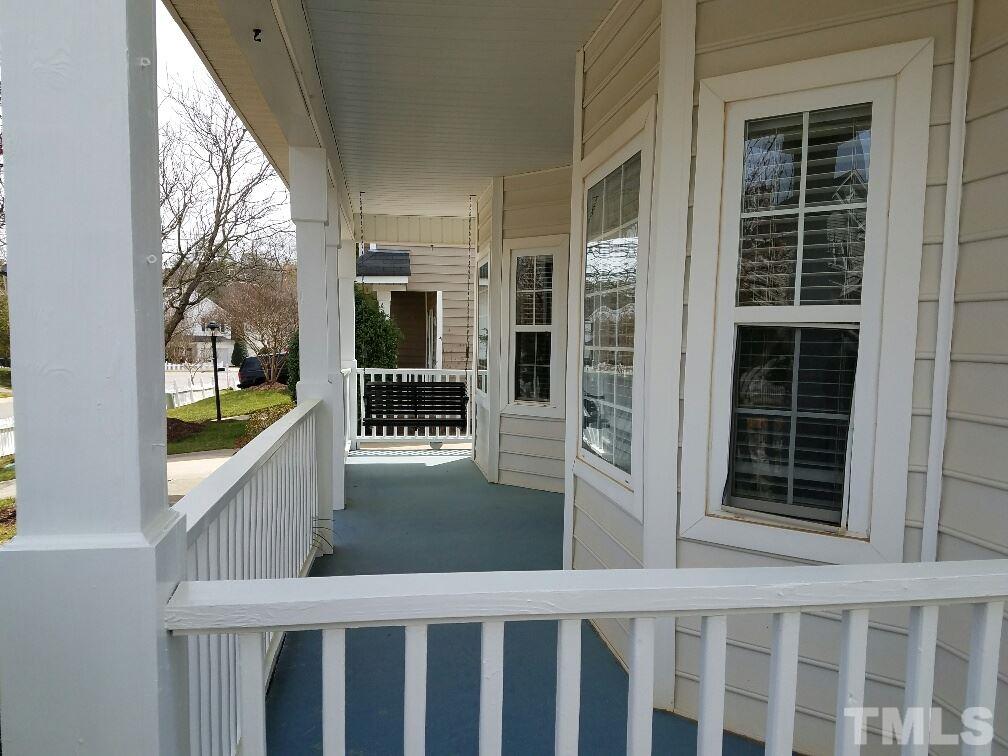 5021 Village Lawn Drive Raleigh, NC 27613 - Photo 2 of 9 a view of balcony with staircase