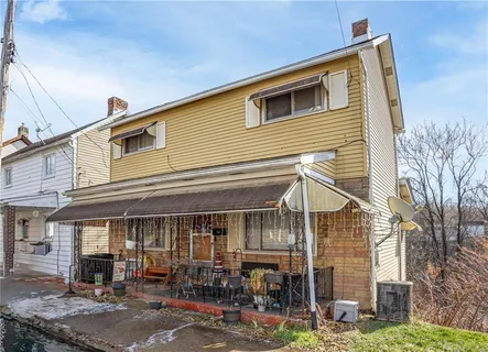 a view of a house with patio