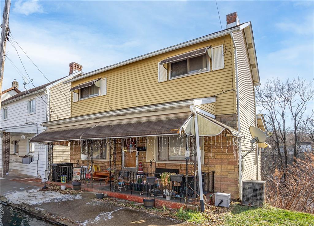 a view of a house with patio
