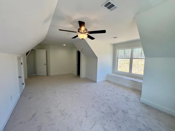 a view of a room with racks on the wall