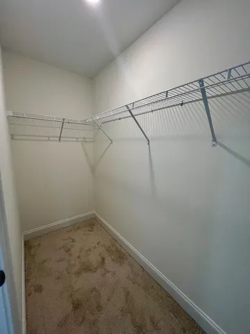 a view of a living room and a fireplace