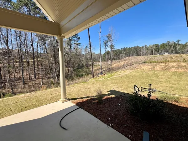a view of yard covered with snow
