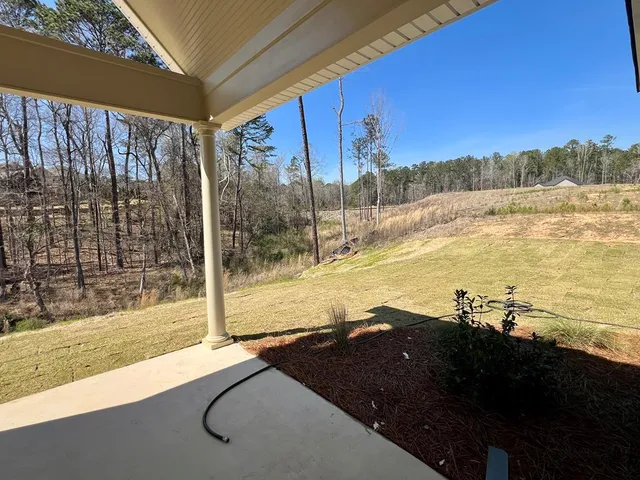 a view of yard covered with snow