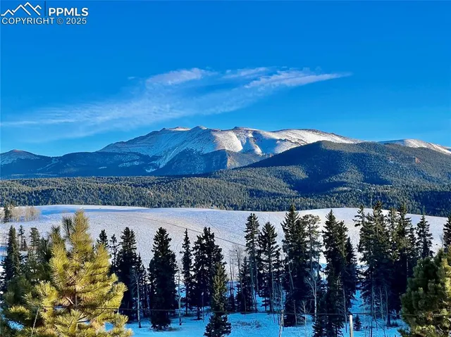 a view of mountain with outdoor space