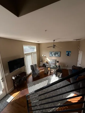 a kitchen with a refrigerator and a stove