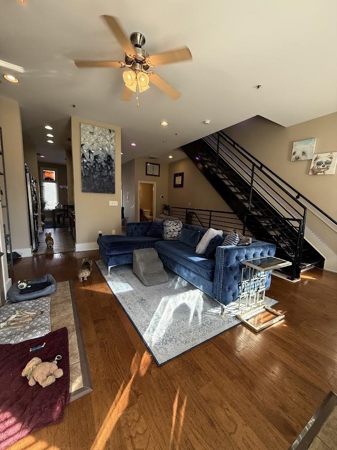 600 Tennessee Street, Unit 108 Memphis, TN 38103 - Photo 6 of 23 a living room with furniture and a chandelier