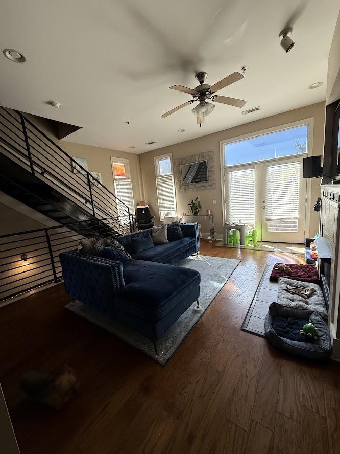 600 Tennessee Street, Unit 108 Memphis, TN 38103 - Photo 7 of 23 a living room with furniture and a chandelier