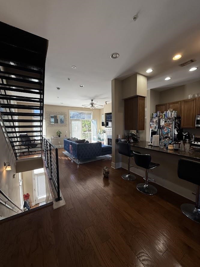 600 Tennessee Street, Unit 108 Memphis, TN 38103 - Photo 23 of 23 a living room with furniture and a flat screen tv
