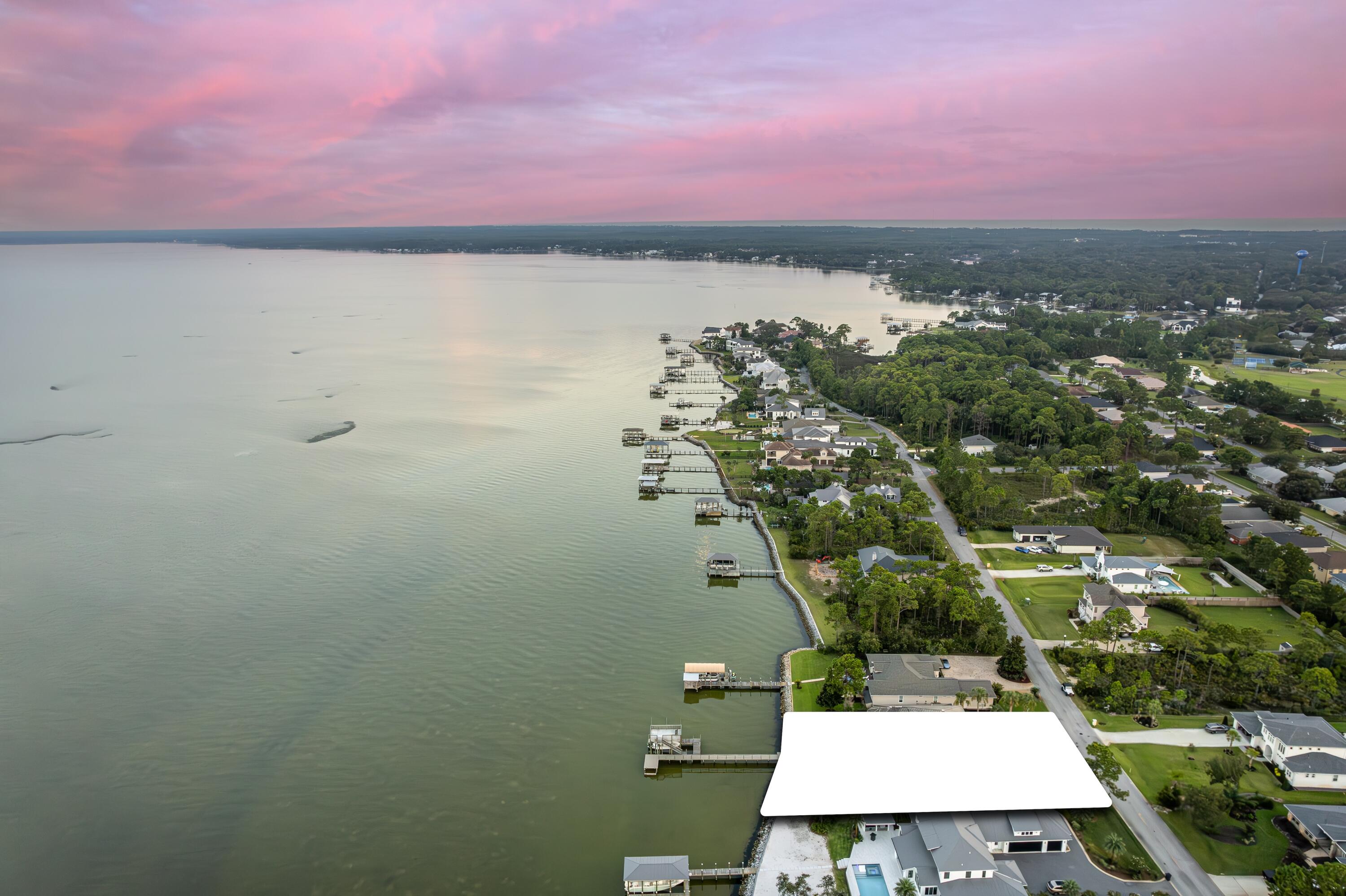 1421 Driftwood Point Road Santa Rosa Beach, FL 32459 - Photo 2 of 7 an aerial view of a house with a yard