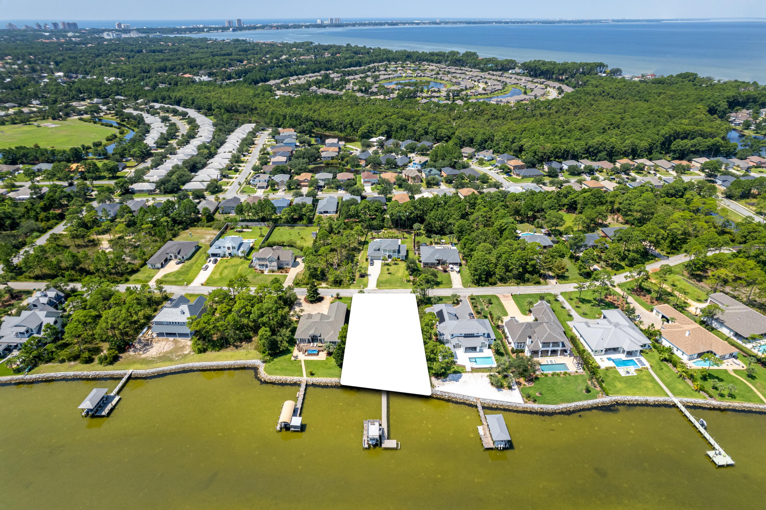 1421 Driftwood Point Road Santa Rosa Beach, FL 32459 - Photo 5 of 7 an aerial view of residential houses with outdoor space