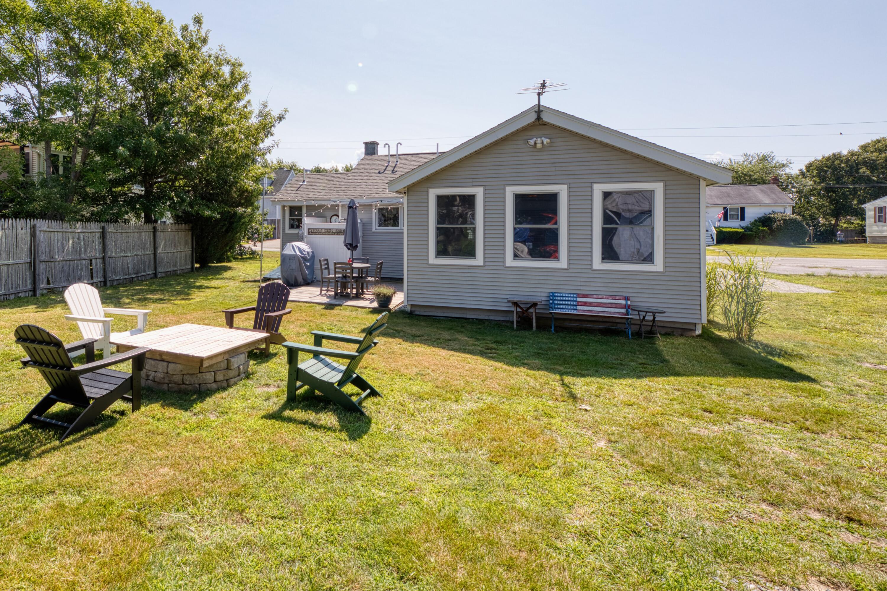 41 Bourne Neck Drive Buzzards Bay, MA 02532 - Photo 13 of 52 a swimming pool view with a outdoor seating