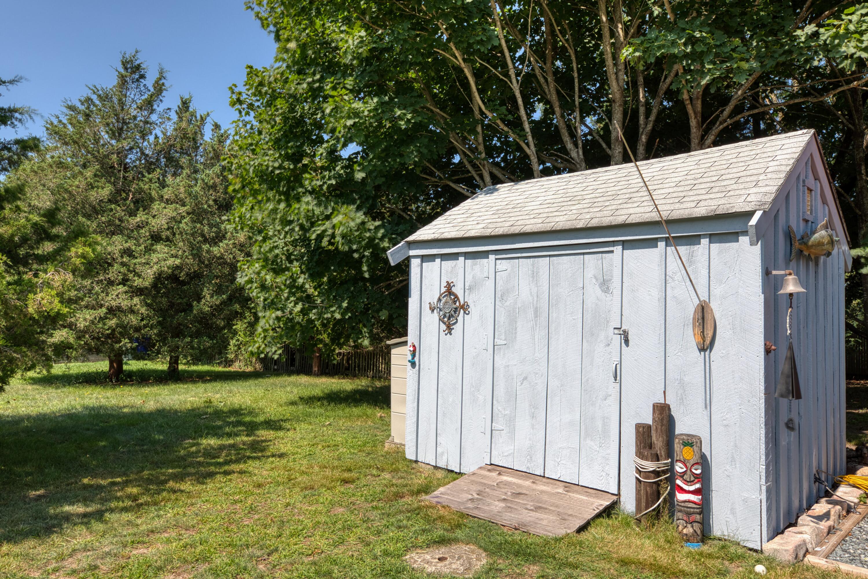 41 Bourne Neck Drive Buzzards Bay, MA 02532 - Photo 17 of 52 a backyard of a house with lots of green space