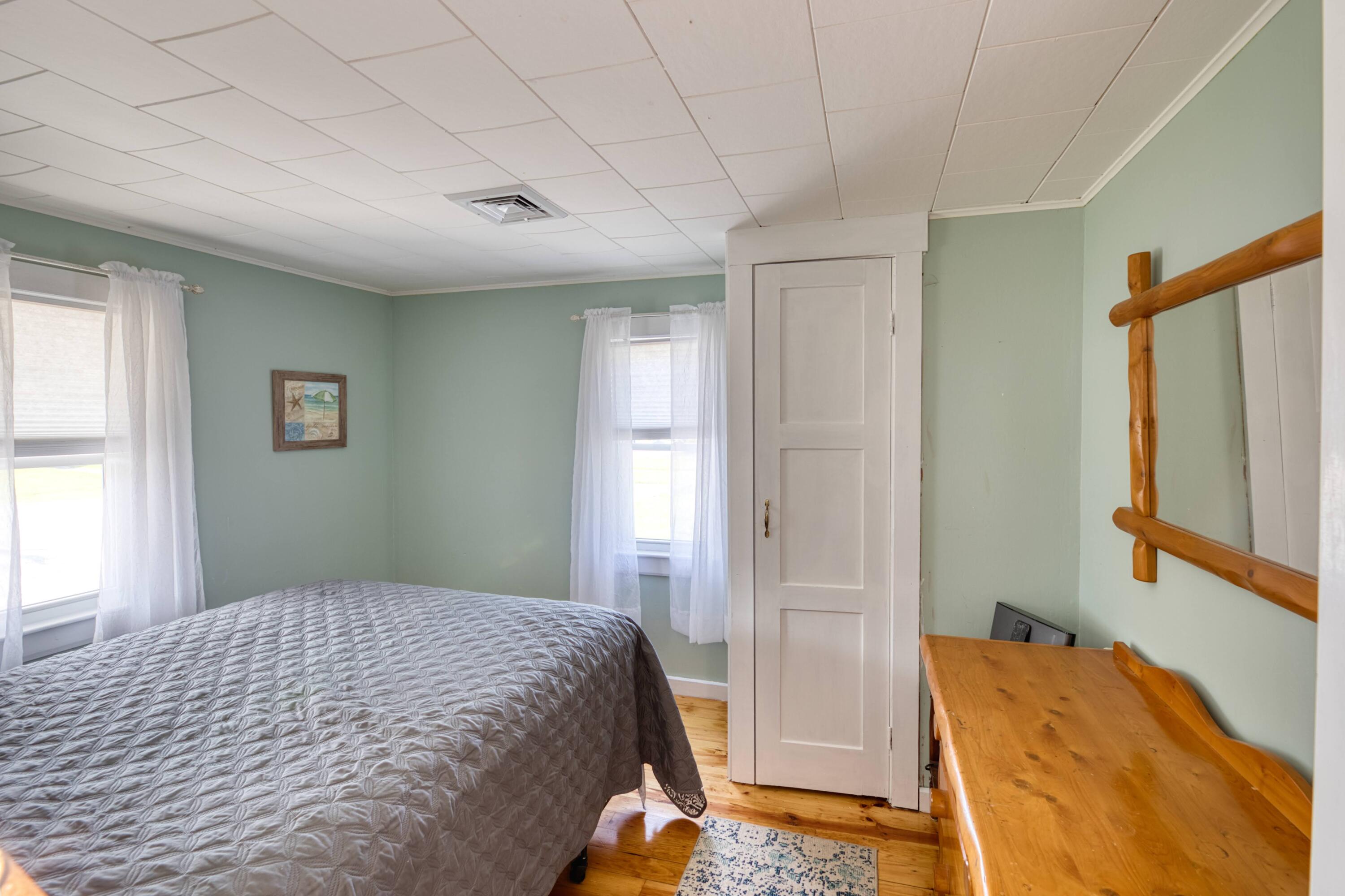 41 Bourne Neck Drive Buzzards Bay, MA 02532 - Photo 33 of 52 a bedroom with a bed and a window